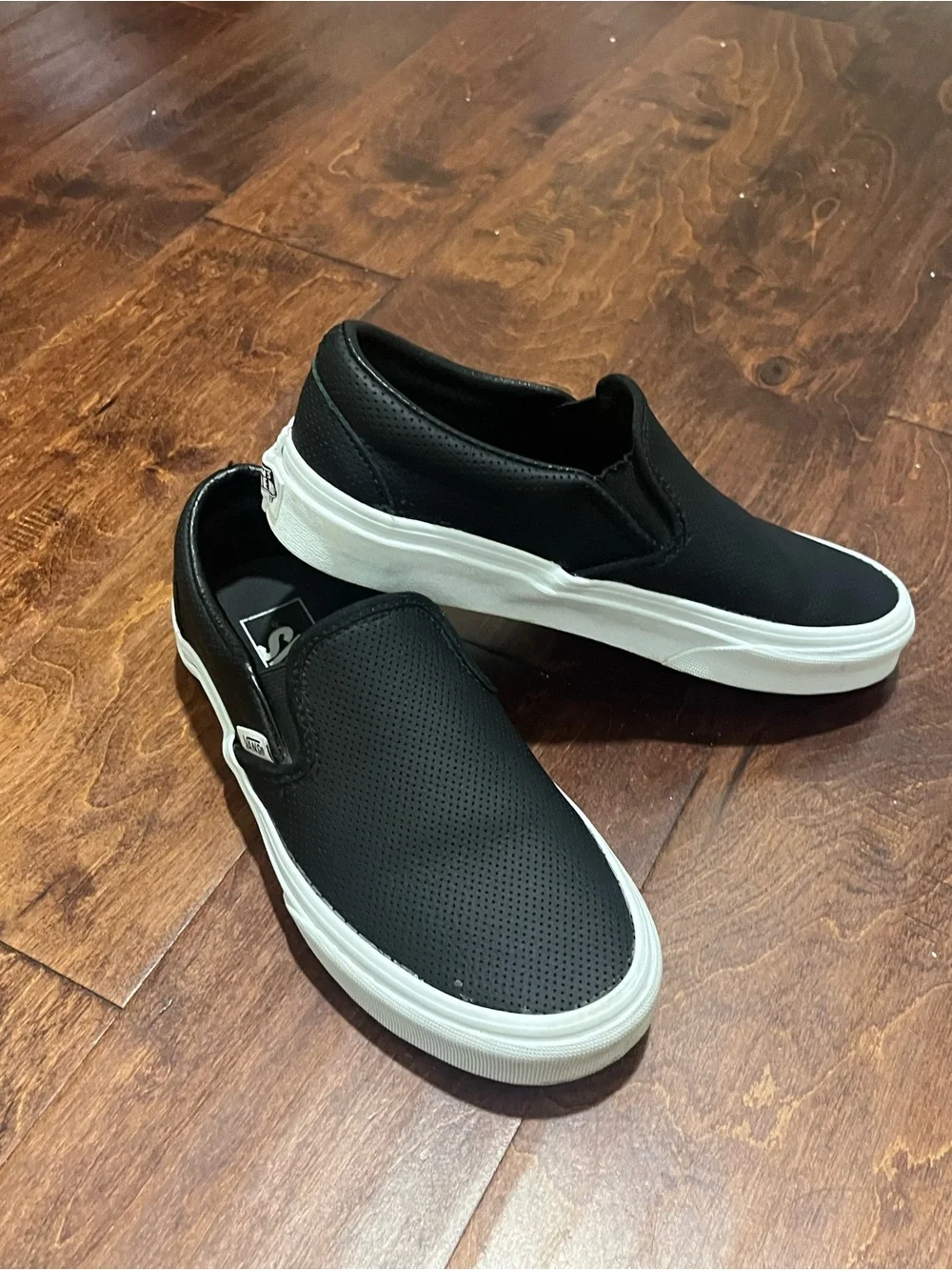 Vans Black Perforated Slip-On Sneakers with White Sole. Unisex